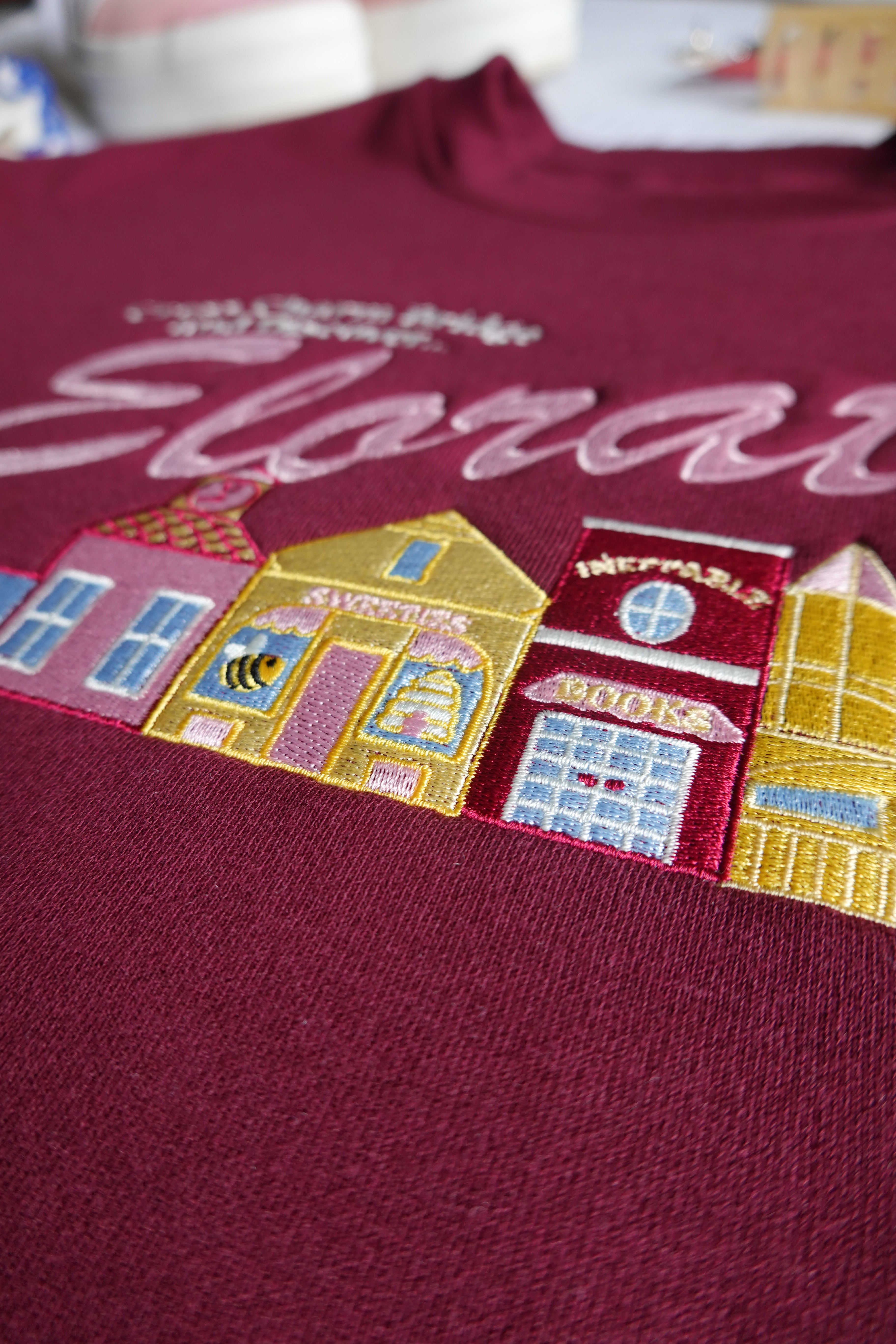 Discover Eloraton Embroidered Crewneck (A Novel Love Story)