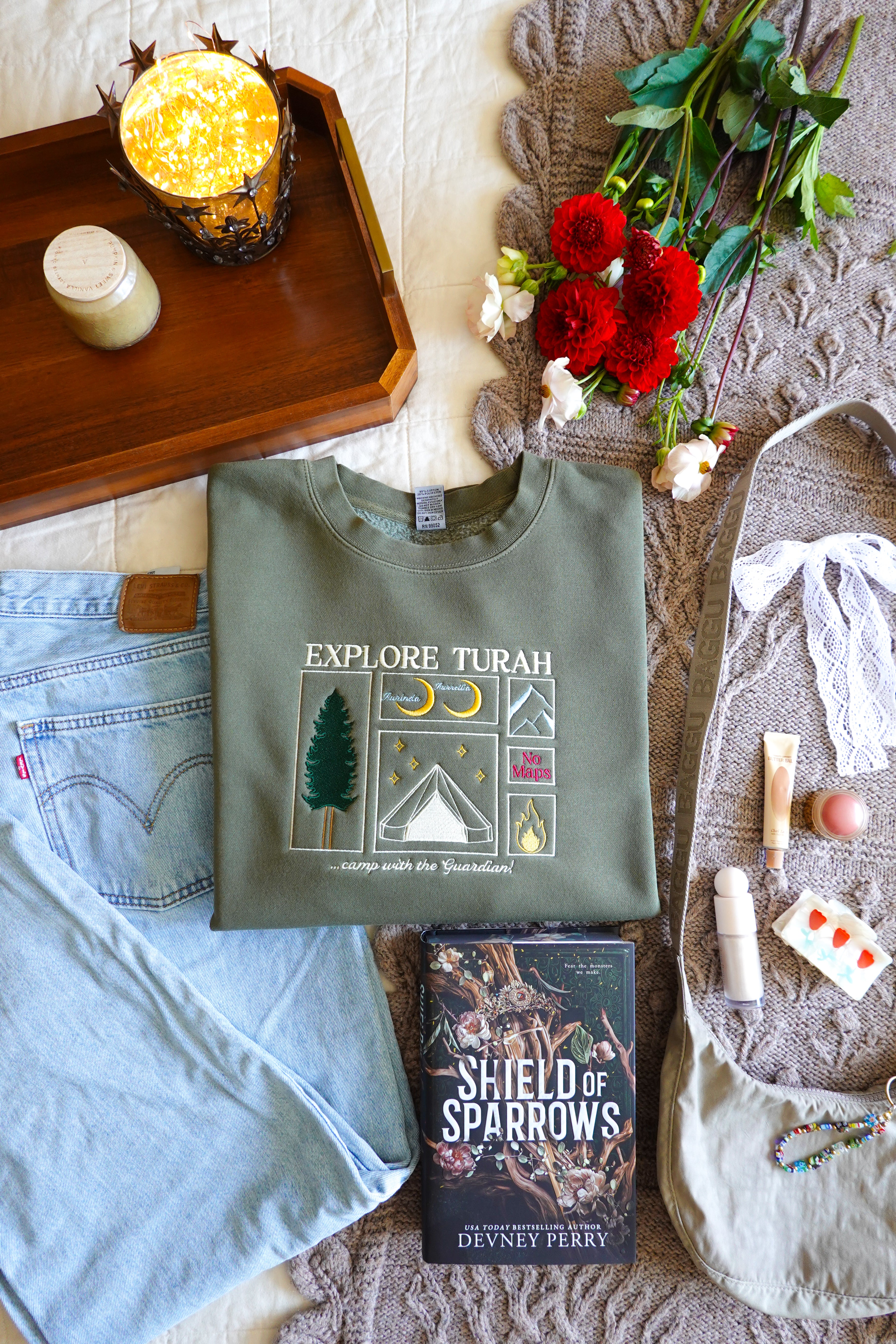 Explore Turah Embroidered Crewneck (Shield of Sparrows)