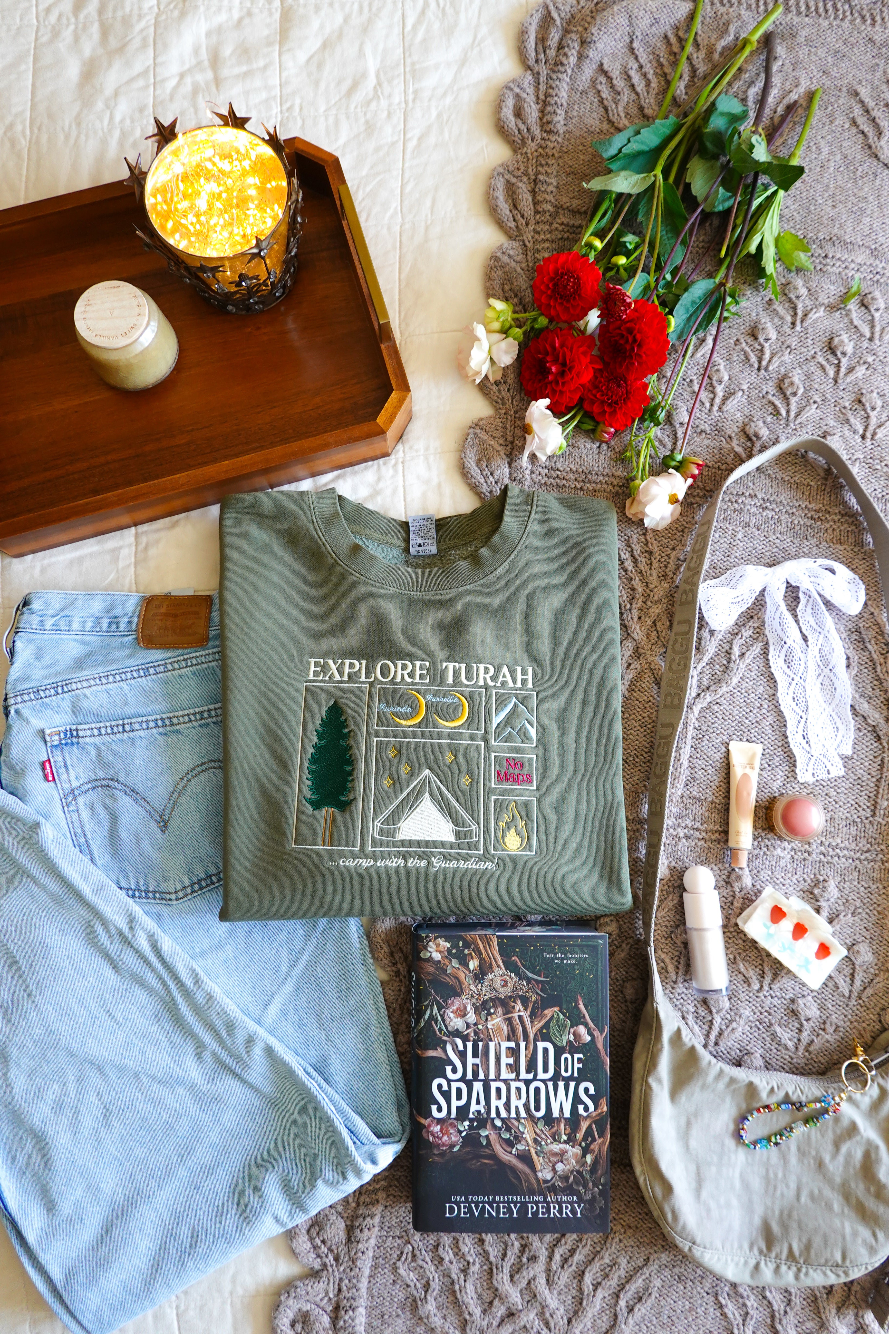 Explore Turah Embroidered Crewneck (Shield of Sparrows)