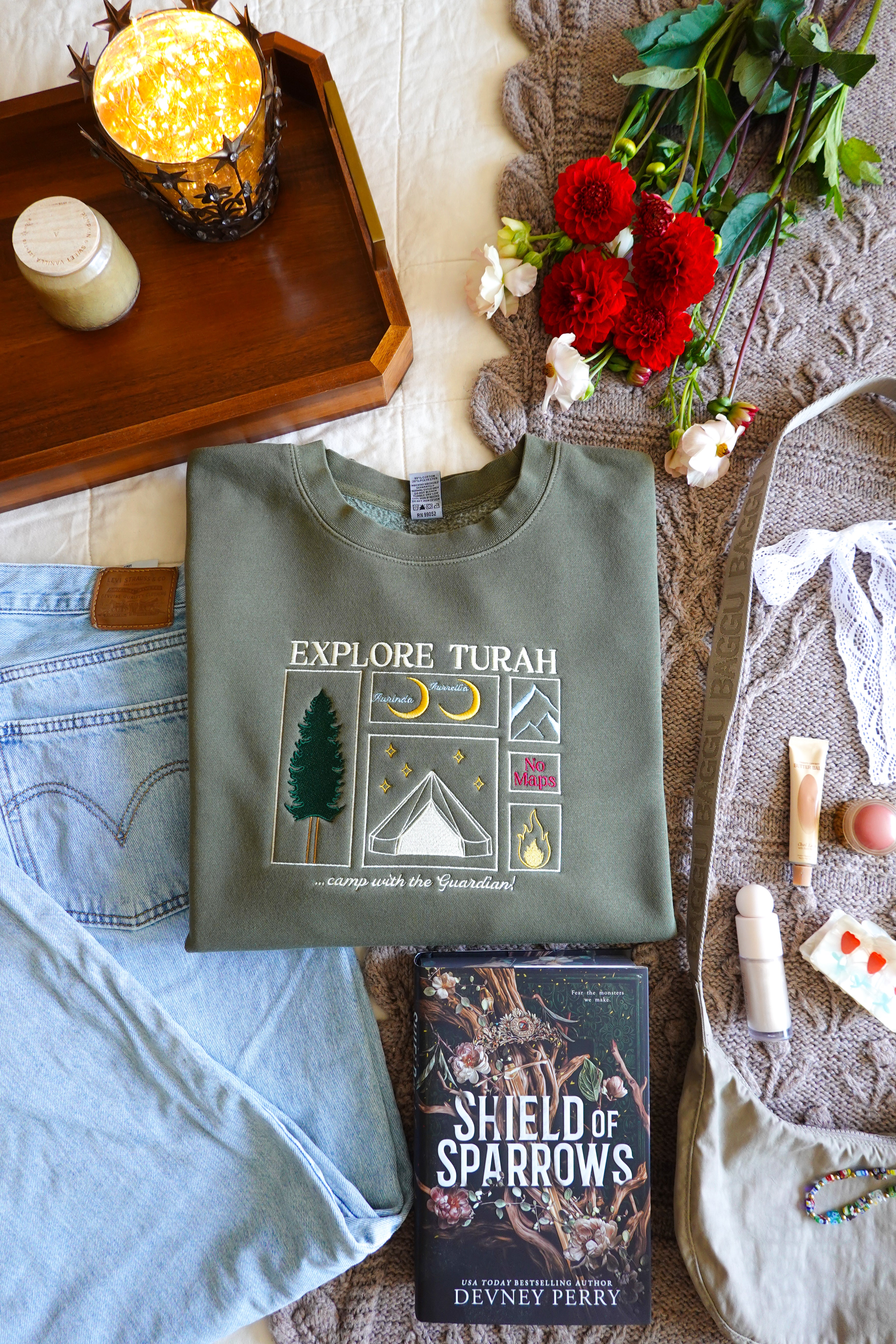 Explore Turah Embroidered Crewneck (Shield of Sparrows)