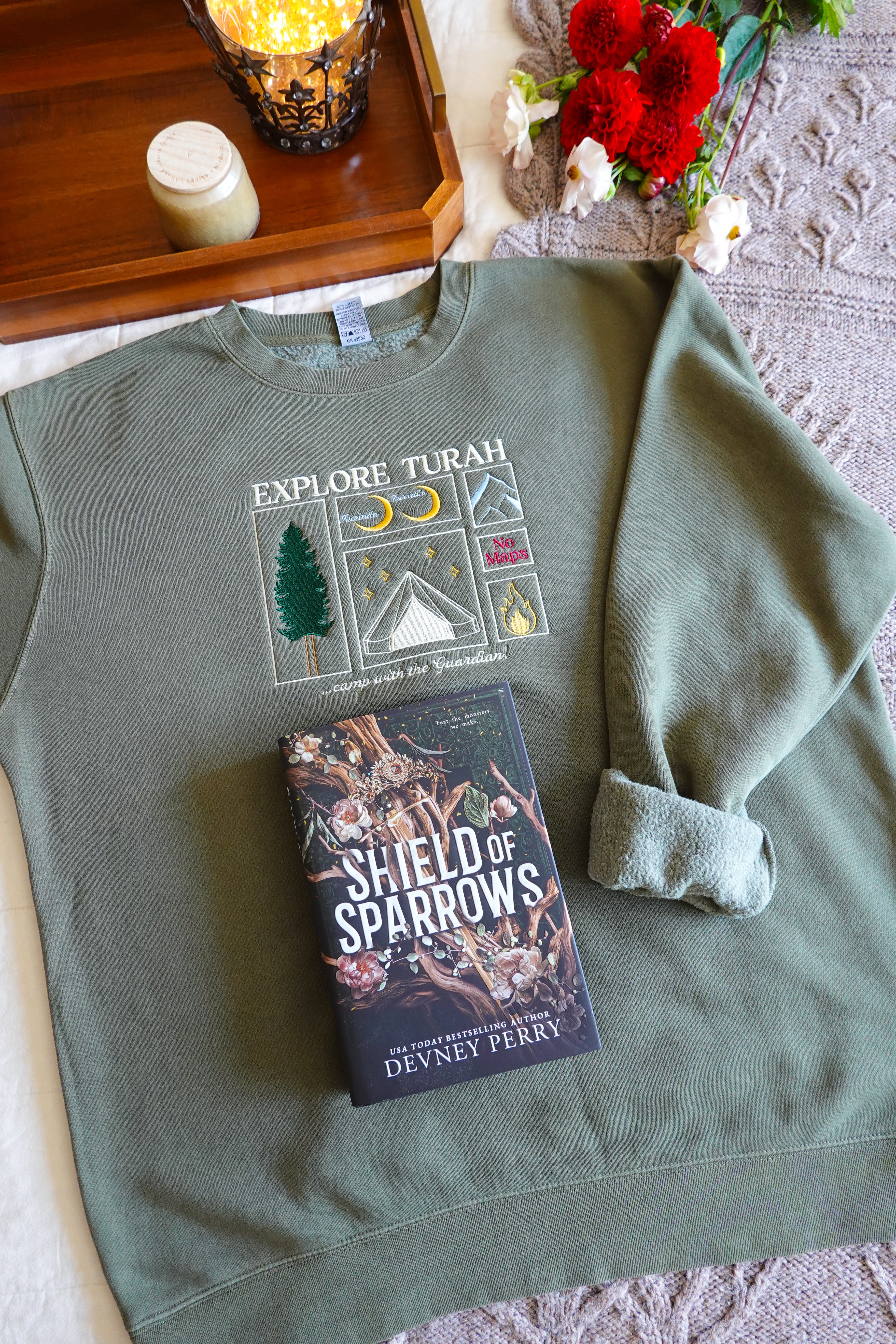 Explore Turah Embroidered Crewneck (Shield of Sparrows)